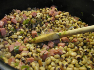 ... black-eyed peas mixed with white beans or pintos that I eat with some