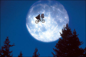 The very classic scene - Elliot and ET are flying over the moon on ...