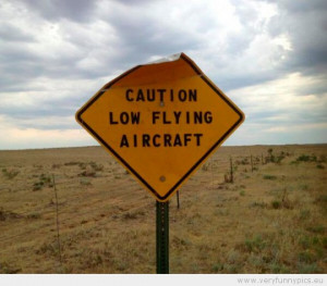 funny-picture-sign-saying-caution-low-flying-aircraft-