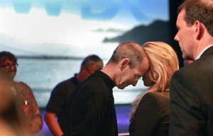 steve jobs rests his head against his wife laurene powell jobs after ...