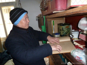 Chinese blind Christian Ma Hongming reading the braille Bible. Photo ...