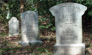The names on the tombstones are real.