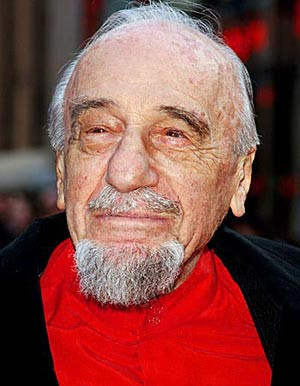 show business icon with his trademark goatee and baton, Miller is ...