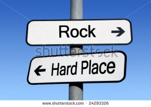Between Rock And Hard Place...