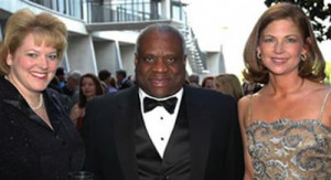 Supreme Court Justice Clarence Thomas, his wife Virginia, and someone ...