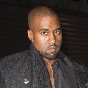 Kim Kardashian and Kanye West at PFW SS14 Givenchy show