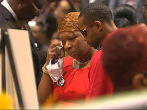 Michael Brown's family sat at the front of the church as thousands of ...