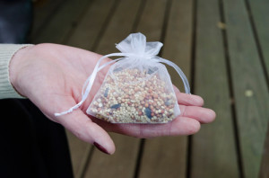 Brad's parents surprised the couple with packets filled with birdseed ...