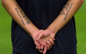 Think ink: David Beckham's tattooed forearms Photo: AP
