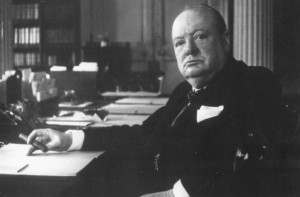 May 1940: Prime Minister Sir Winston Churchill sitting behind his desk ...