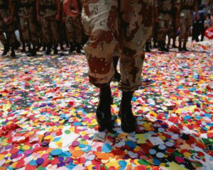 Solider walking in confetti after parade - VisionsofAmerica/Joe Sohm ...