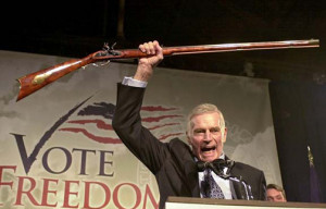 National Rifle Association president Charlton Heston addresses gun ...