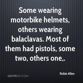 Some wearing motorbike helmets, others wearing balaclavas. Most of ...