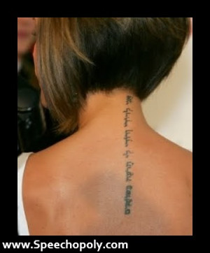 Wonderful Hebrew Tattoo On Girl Upperback