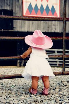 sweet in her pink hat and boots More