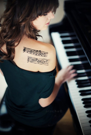 See more Musical tattoo on back shoulder
