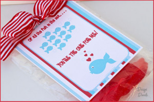 Fill a white lunch bag with goodies. Fold the top over and sew.