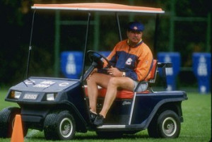 of the Chicago Bears watches his team from a golf cart during Bears ...