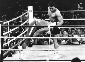 Muhammed Ali watches George Foreman head for the canvas after being ...