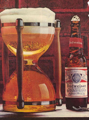 An old magazine Budweiser ad featuring an hourglass filled with beer ...