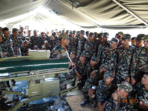 Troops from Nepal Army being introduced to Indian Army weapons