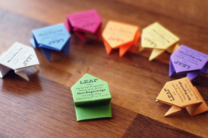 These origami jumping frogs make great invites.