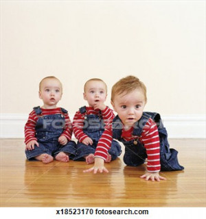 Triplet baby boys (9-12 months) on hardwood floor View Large Photo ...