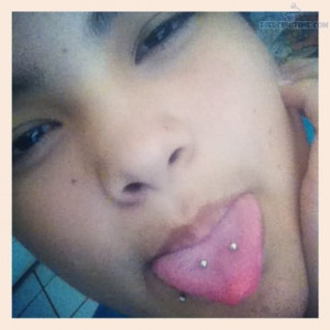 Scoop tongue piercing. If its done rightt ^^^^^ its cute afff!!