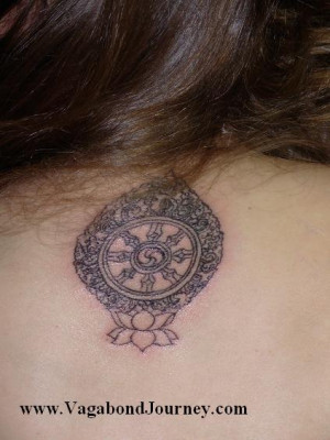 tibetan tattoo design on upper back
