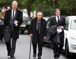 Frail: Fraser (centre) attends the funeral of his former gangland boss ...
