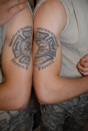 Army Fire Fighter Tattoo On Muscles