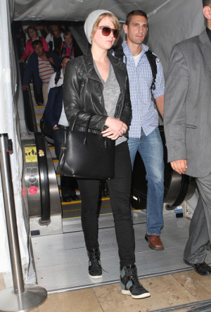 Jennifer Lawrence Wearing a Beanie at LAX
