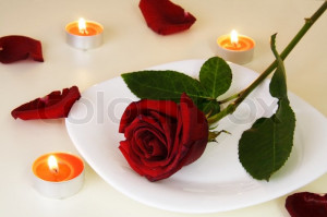 Table Setting with Rose for Romantic Candlelight Dinner, stock photo