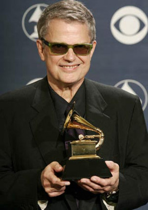 Charlie Haden poses backstage with his award at the 47th annual Grammy ...