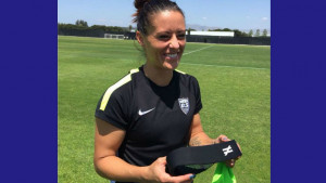 Ali Krieger shows off her head protection before the USWNT match ...
