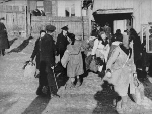 Jewish police direct people to the assembly area in the Kovno ghetto ...