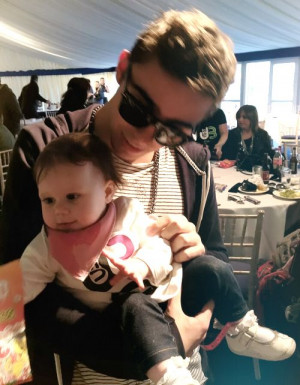 Nathan with a baby