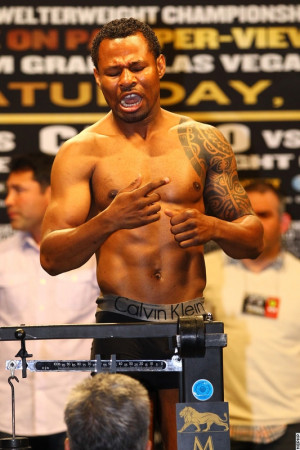 Photos: Floyd Mayweather, Miguel Cotto Tense Weigh-In