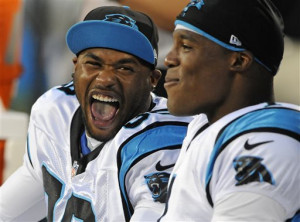 Carolina Panthers' Steve Smith, left, and Cam Newton, right, share a ...