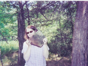 Bette Nebeker (a descendent) holding a chip from the top of John Geery ...