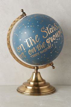 Hand painted globe blue with Roosevelt's quote 