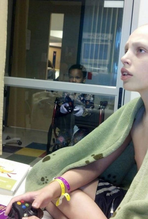... video games with his friend who's stuck in quarantine at the hospital