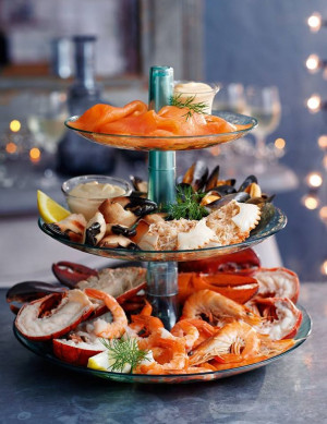 Serve mixed cold seafood on a cake stand as an elegant starter. Serve ...