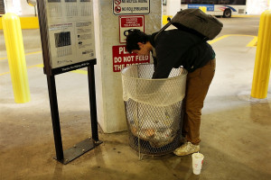 ... addict looks for food among garbage in Camden, N.J., Oct. 11, 2012