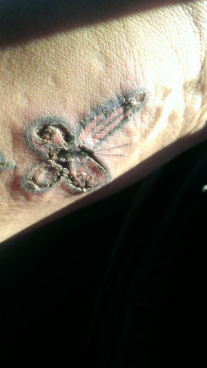 ... , we commiserate about healing our fresh tattoos.-tat-1-24-14-2.jpg