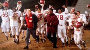 Denzel Washington (center right) as coach Herman Boone and Will Patton ...