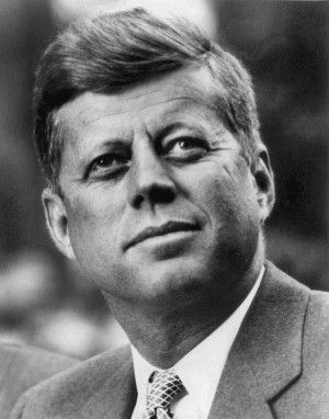 Description John F. Kennedy, White House photo portrait, looking up ...