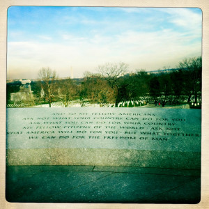 JFK’s famous quote overlooks the cemetery next to his gravesite