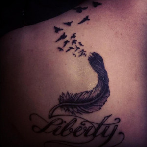 Liberty and flying birds tattoo on back - Tattoo Mania