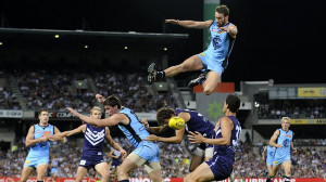 Carlton's Andrew Walker flies high against the Fremantle Dockers last ...